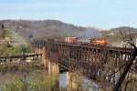 W&LE, Wheeling and Lake Erie GP35 2662 leads 100, AVR 3003,3001, 3004 westbound on the ex-P&WV bridge over the Monongahela River at, Speers Pennsylvania. March 27, 2012. 